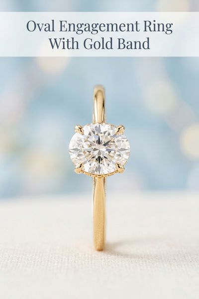 oval engagement ring with gold band
