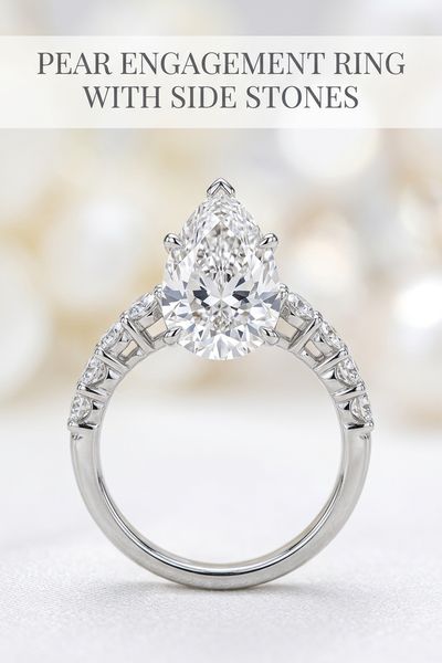 pear engagement ring with side stones