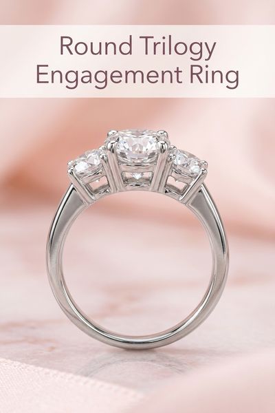 round trilogy engagement ring