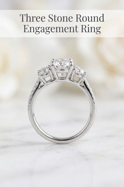 three stone round engagement ring